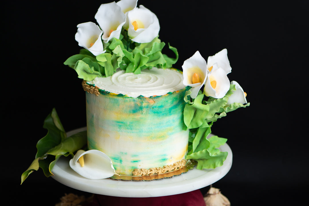 Close-up macro photography of a Chipper & Cheeky luxury gluten-free celebration cake canvas adorned with delicate, handmade sugar petal decorations for an elite celiac-safe private event in Los Angeles.