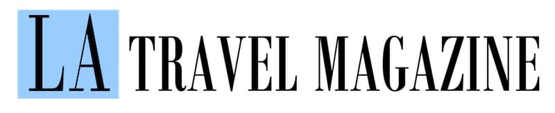 LA Travel Magazine logo with black serif text on a white background, where the letter A is inside a light blue square.