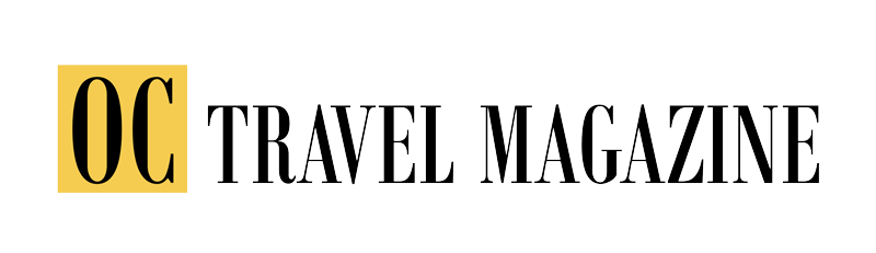 A logo-style graphic reading 'OC TRAVEL MAGAZINE' on a solid green background, with 'OC' in black inside a yellow square and the rest of the text in black serif letters.